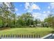 Picturesque backyard view showcasing ample green space and serene surroundings, perfect for relaxation and enjoyment at 2601 Semmes St, Atlanta, GA 30344