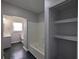 This bathroom has a tub with shower, and a view of the closet at 2601 Semmes St, Atlanta, GA 30344