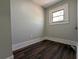 This bedroom has hardwood floors and a window with a view at 2601 Semmes St, Atlanta, GA 30344