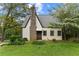 Exterior view of a charming cottage with a stone chimney at 2601 Semmes St, Atlanta, GA 30344