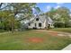 Charming home with well-maintained lawn, stone chimney, and inviting curb appeal at 2601 Semmes St, Atlanta, GA 30344