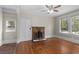 Bright living room with hardwood floors and a stone fireplace at 2601 Semmes St, Atlanta, GA 30344