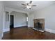 Spacious living room featuring hardwood floors and stone fireplace at 2601 Semmes St, Atlanta, GA 30344