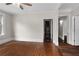 Living room featuring hardwood floors and staircase at 2601 Semmes St, Atlanta, GA 30344