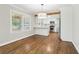Eat-in kitchen featuring white cabinets, stainless steel appliances, and hardwood floors at 353 Oak Ridge Se Dr, Marietta, GA 30060