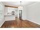 Kitchen featuring white cabinets, stainless steel refrigerator, and hardwood floors at 353 Oak Ridge Se Dr, Marietta, GA 30060