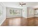 Spacious living area featuring hardwood floors, neutral paint, white trim, and large windows at 353 Oak Ridge Se Dr, Marietta, GA 30060
