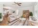 Staged living room with hardwood floors, neutral paint, stylish furniture, and a cozy, bright atmosphere at 353 Oak Ridge Se Dr, Marietta, GA 30060