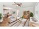 Staged living room with hardwood floors, neutral paint, stylish furniture, and a cozy, bright atmosphere at 353 Oak Ridge Se Dr, Marietta, GA 30060