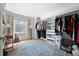 Walk-in closet with custom organization system and natural light at 966 Laurel Springs Sw Ln, Marietta, GA 30064