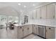 Spacious kitchen with eat-in breakfast nook, quartz counters and stainless steel dishwasher at 966 Laurel Springs Sw Ln, Marietta, GA 30064