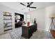 Office features a modern desk and chair plus custom shelving at 966 Laurel Springs Sw Ln, Marietta, GA 30064
