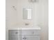 Bathroom vanity with gray cabinets, light countertop, mirror, and modern faucet at 2391 Cove Rd, Lithonia, GA 30058
