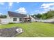 Spacious backyard features a healthy lawn, landscape beds and a gazebo perfect for entertaining at 2650 Hamilton Chase Run, Buford, GA 30519