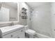 Modern bathroom featuring a sink vanity and tiled walk-in shower at 2650 Hamilton Chase Run, Buford, GA 30519