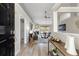 Inviting living room features a wood-look floor, neutral walls, and modern decor at 2650 Hamilton Chase Run, Buford, GA 30519