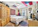This bedroom features bright white walls and hardwood flooring at 2720 Cold Springs Sw Trl, Marietta, GA 30064