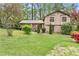 Charming two-story home with landscaped front yard and mature trees at 2720 Cold Springs Sw Trl, Marietta, GA 30064