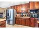 Spacious kitchen with stainless steel refrigerator and ample counter space at 2720 Cold Springs Sw Trl, Marietta, GA 30064