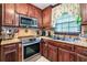 Stylish kitchen with stainless steel appliances and plenty of storage at 2720 Cold Springs Sw Trl, Marietta, GA 30064