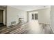 Spacious living room featuring a fireplace and wood-look flooring at 409 Natchez Trce, Sandy Springs, GA 30350