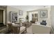 Inviting living room with cozy fireplace and views of the outdoor study at 409 Natchez Trce, Sandy Springs, GA 30350