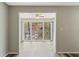 Bright sun room with view of the backyard at 409 Natchez Trce, Sandy Springs, GA 30350