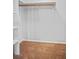 This is a walk-in closet with a built in organizer and a rod for hanging clothes at 409 Natchez Trce, Sandy Springs, GA 30350