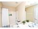 Well-maintained bathroom with a shower-tub combo, vanity, and neutral tones for a clean and functional space at 904 Magnolia Leaf Dr, Woodstock, GA 30188