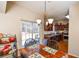 Dining area features wood floors and stylish chandelier at 904 Magnolia Leaf Dr, Woodstock, GA 30188
