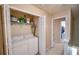Convenient laundry area equipped with modern washer and dryer units at 904 Magnolia Leaf Dr, Woodstock, GA 30188