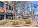 A quaint brick-paved area lined with local shops and restaurants, offering a vibrant and walkable urban experience at 904 Magnolia Leaf Dr, Woodstock, GA 30188