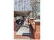 Inviting street view featuring brick-paved walkways, storefronts, and outdoor dining, perfect for a leisurely stroll at 904 Magnolia Leaf Dr, Woodstock, GA 30188