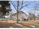 Spacious backyard featuring a lovely home, well-maintained lawn and greenery at 1085 Grace Hadaway Ln, Lawrenceville, GA 30043