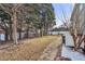 A backyard featuring a brick walking-path, grass and trees at 1085 Grace Hadaway Ln, Lawrenceville, GA 30043