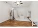 Bright, empty room with wood flooring, perfect for office or studio, with ample natural light at 1085 Grace Hadaway Ln, Lawrenceville, GA 30043