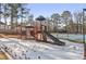 A park featuring a playground and tennis court surrounded by trees at 1085 Grace Hadaway Ln, Lawrenceville, GA 30043