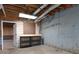 Unfinished basement area showing the mechanical elements of the house, and a workbench at 1514 Haven Crest Dr, Powder Springs, GA 30127