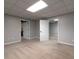 Large basement area with multiple doorways, neutral carpet and recessed lighting at 1514 Haven Crest Dr, Powder Springs, GA 30127