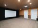 Finished basement featuring a home theater, recessed lighting and painted walls at 1514 Haven Crest Dr, Powder Springs, GA 30127