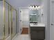 Bathroom showcasing a single sink vanity, glass shower, and access to walk in closet at 1514 Haven Crest Dr, Powder Springs, GA 30127