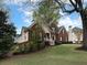 Beautiful brick home with well-kept lawn and mature trees at 1514 Haven Crest Dr, Powder Springs, GA 30127