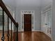 Inviting foyer with hardwood floors and decorative trim at 1514 Haven Crest Dr, Powder Springs, GA 30127