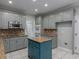 Stylish kitchen equipped with stainless steel appliances, granite countertops, and a functional island at 1514 Haven Crest Dr, Powder Springs, GA 30127