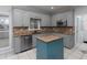 Charming kitchen with stainless steel appliances, granite countertops, island, and tile backsplash at 1514 Haven Crest Dr, Powder Springs, GA 30127