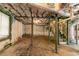 Unfinished basement with exposed utilities, insulation, and stairs at 1951 Brannen Se Rd, Atlanta, GA 30316