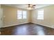 Spacious bedroom with hardwood floors, and bright windows at 1951 Brannen Se Rd, Atlanta, GA 30316