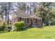 Traditional brick home with front lawn, showcasing its classic design at 1951 Brannen Se Rd, Atlanta, GA 30316