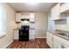 Kitchen with black appliances and laminate countertops at 1951 Brannen Se Rd, Atlanta, GA 30316