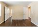 Spacious living room with hardwood floors and multiple doorways at 1951 Brannen Se Rd, Atlanta, GA 30316